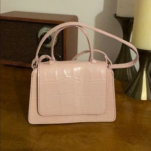 Baby pink faux croc crossbody bag